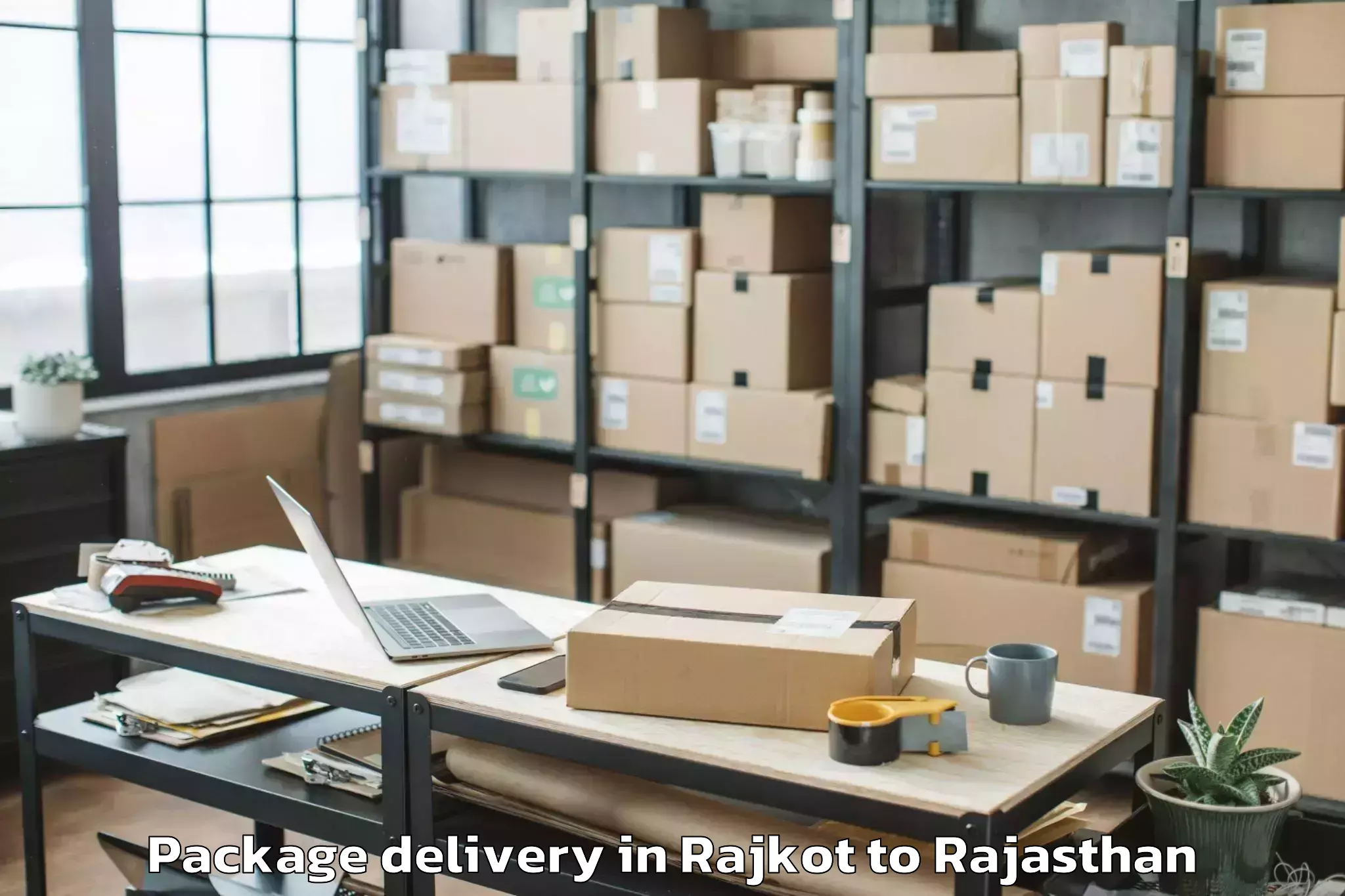 Professional Rajkot to Niit University Neemrana Package Delivery